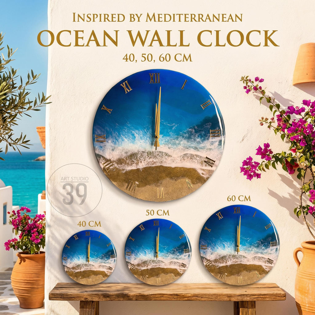 Ocean-themed wall clocks in various sizes: 40, 50, and 60 cm. The clocks feature a blue and white ocean design with gold Roman numerals and hands. The clocks are displayed on a wooden surface.