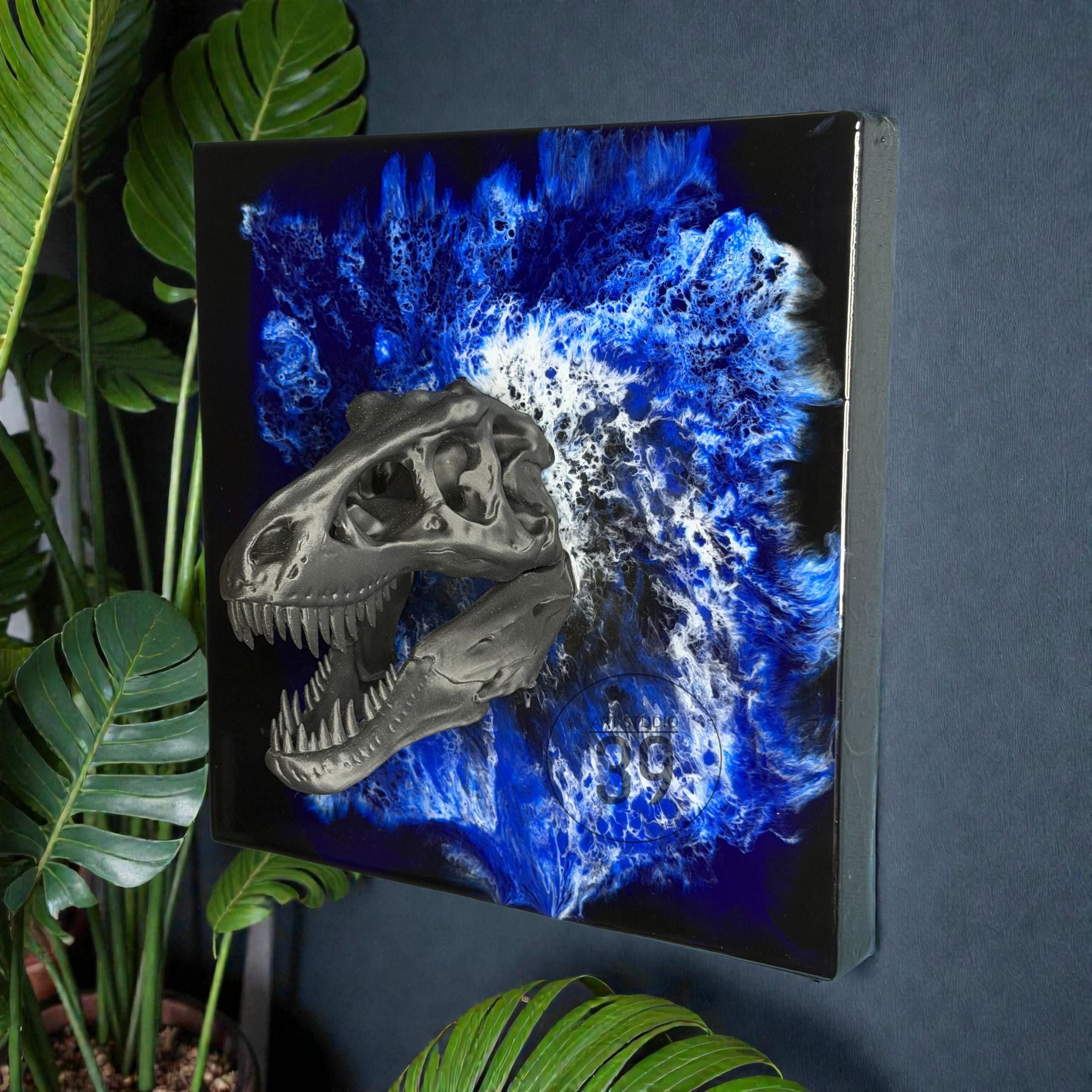 A square canvas art piece featuring a gray dinosaur skull emerging from a blue and white abstract background. The artwork has a dark blue and black border.