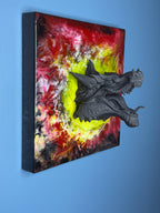 A square wall art piece featuring a 3D dragon head emerging from a vibrant, abstract background. The dragon head is gray, with detailed scales and an open mouth. The background has swirls of red, yellow, and black.
