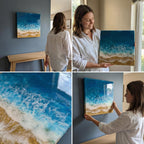 Square resin art piece depicting a beach scene. The artwork features a deep blue ocean, white foamy waves, and a golden sand shore. The piece is mounted on a wall, showcasing the vibrant colors and textures of the ocean and beach.