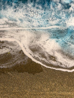 Abstract artwork depicting a beach scene with foamy white waves crashing onto a sandy shore. The water transitions from deep blue to white, with the sand appearing in shades of brown and tan. The number "39" is visible in the upper right corner.