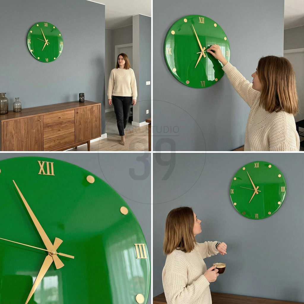 A green wall clock with gold-colored hands and Roman numerals. The clock is round and mounted on a gray wall. The clock's face has gold-colored dots marking the hours.