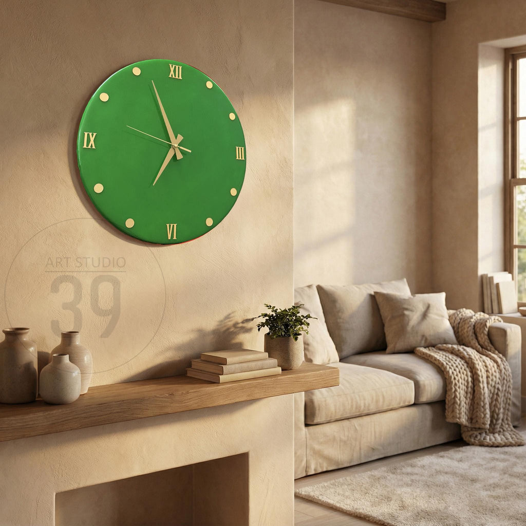 A round, green wall clock with gold Roman numerals and hands. The clock is mounted on a beige wall. The clock's face has gold dots marking the hours. The clock is a decorative element in a living room setting.