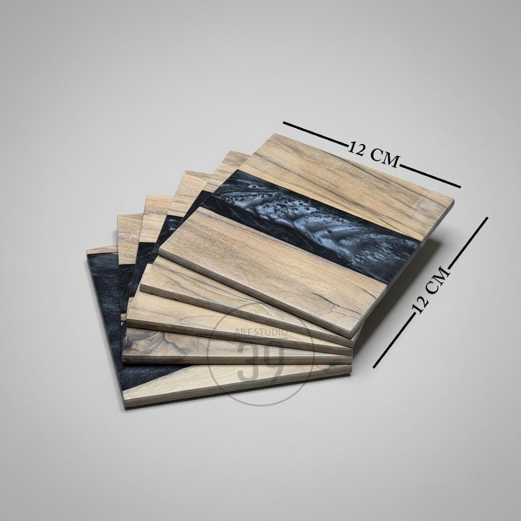 A stack of six square coasters, each measuring 12 cm. The coasters feature a light wood grain design with a dark blue and gray resin river. The coasters are from the "ART STUDIO" brand.
