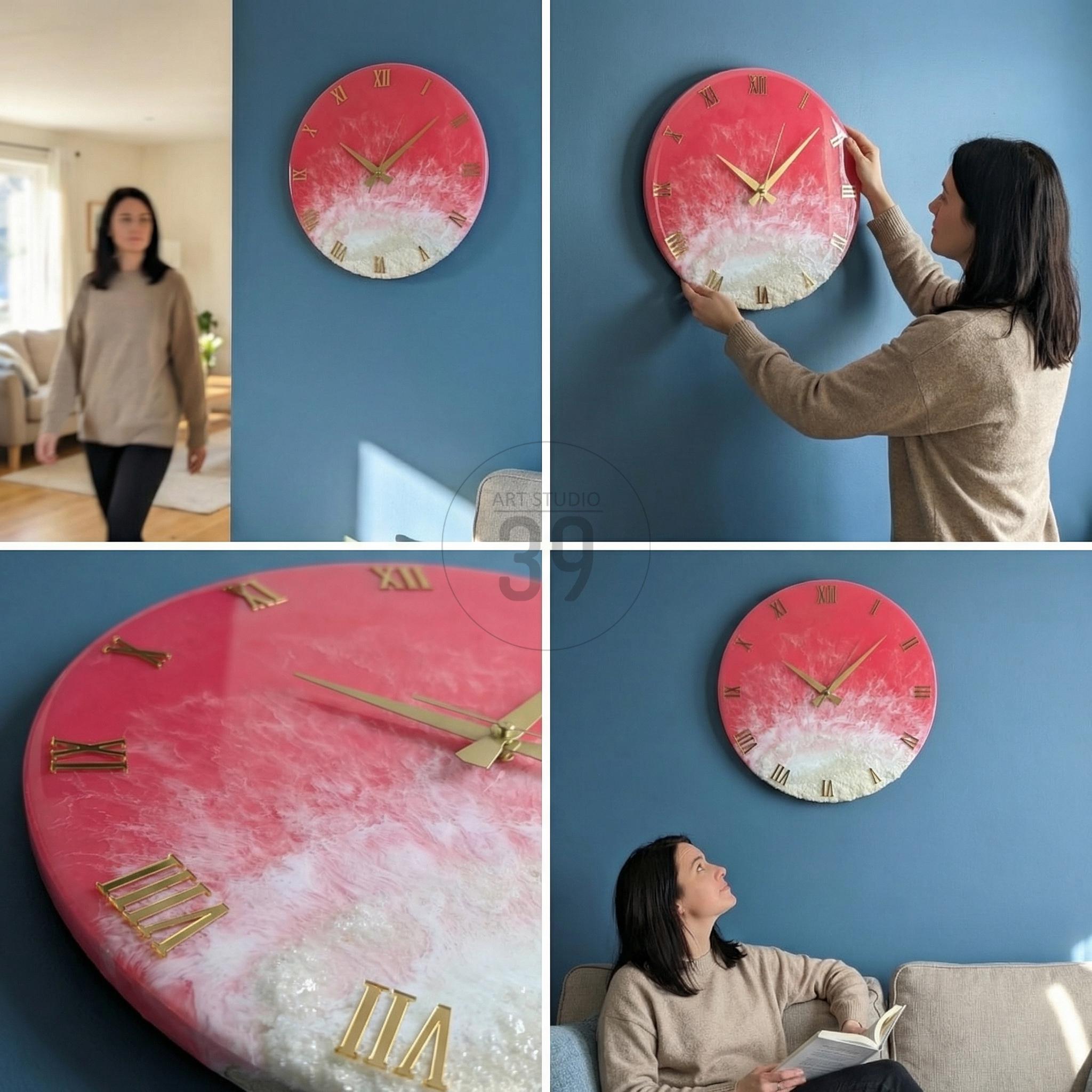 A round wall clock with a red and white design, gold hands, and Roman numeral hour markers. The clock is mounted on a blue wall. The clock's diameter is approximately 12 inches.