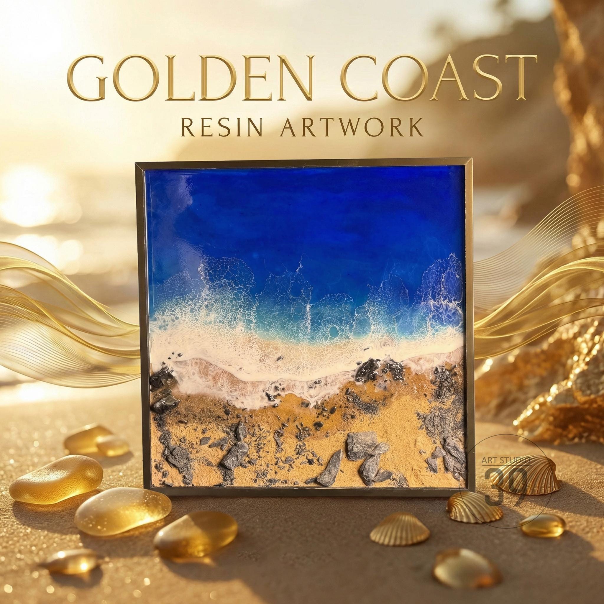 Square resin artwork titled "Golden Coast" depicts a beach scene with a blue ocean, white waves, and golden sand. The artwork is framed in a dark metal frame. The artwork is surrounded by golden decorative elements and seashells.