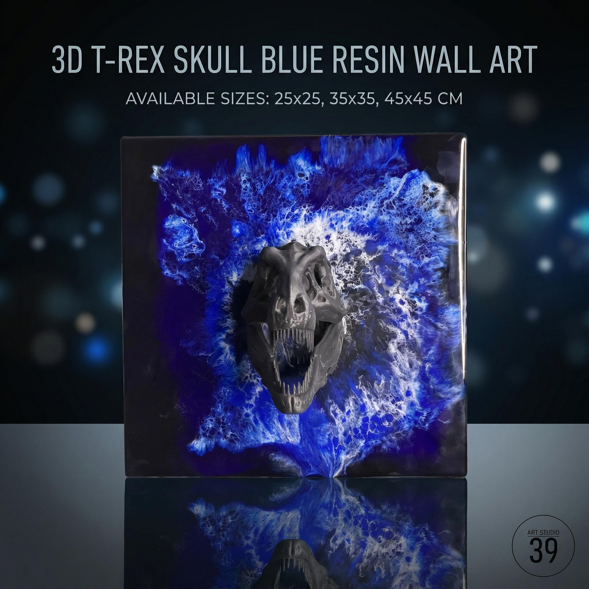 A 3D T-Rex skull wall art piece made of blue resin. The artwork features a dark gray dinosaur skull against a vibrant blue background. Available sizes are 25x25 cm, 35x35 cm, and 45x45 cm.