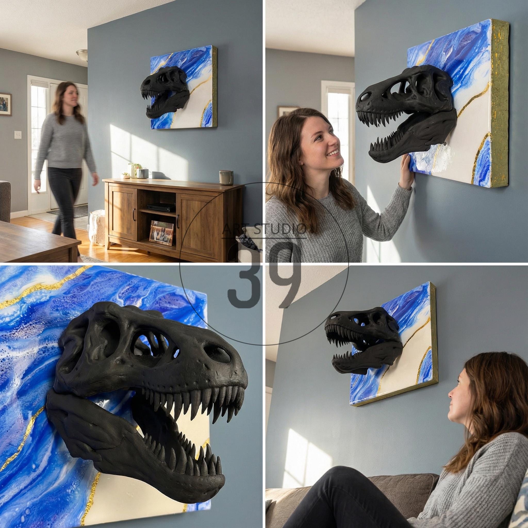 A black dinosaur skull sculpture mounted on a square canvas. The canvas features a blue and white abstract design with gold accents. The artwork is displayed on a gray wall.