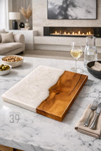 A rectangular serving board with a white resin top and a natural wood base. The board has a smooth, polished finish and is ideal for serving appetizers or charcuterie. The text "ART STUDIO 39" is visible.
