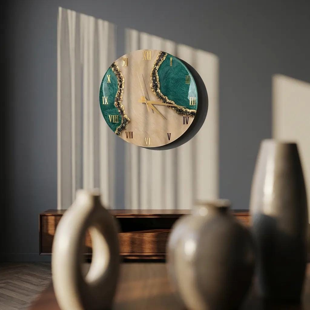 A round wall clock featuring a beige center with two dark green, textured resin sections on the sides. The clock face includes gold Roman numerals and thin gold hands. The design mimics a geode with gold-toned edges along the green areas.
