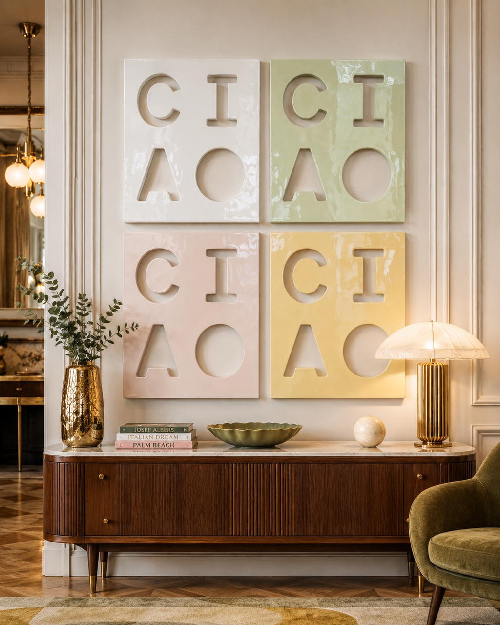 Four rectangular wall panels arranged in a grid, each featuring cut-out letters C, I, A, and O. The panels are colored in white, light green, pale pink, and soft yellow. Each panel has a glossy finish and uniform geometric shapes.