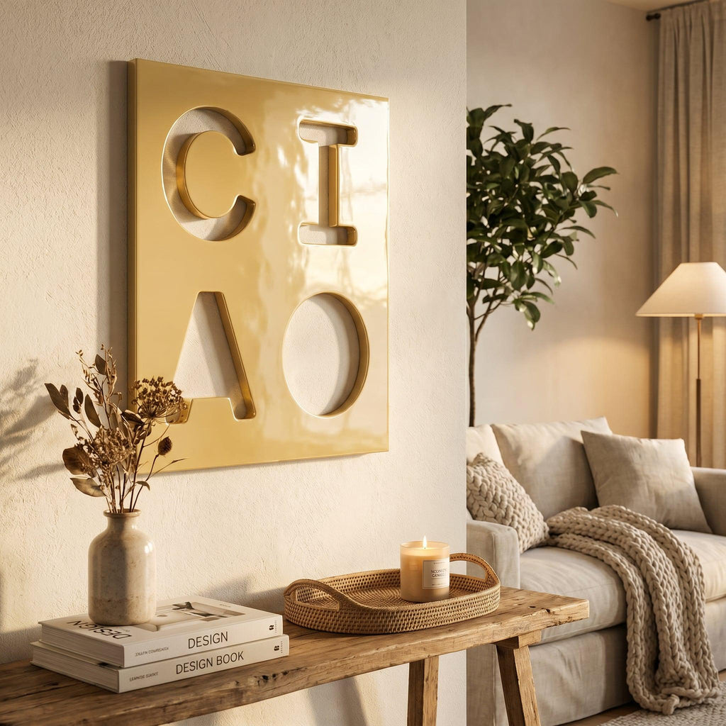 A square, glossy mustard-yellow wall art piece featuring the cutout letters C, I, A, and O arranged in a two-by-two grid. The letters are bold, sans-serif, and create negative space through the panel, mounted on a light-colored wall.