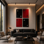 Four rectangular wall art panels arranged in a grid, featuring playing card suit symbols. Two panels are black with club and spade cutouts, and two are red with heart and diamond cutouts, mounted above a dark gray sofa in a room.