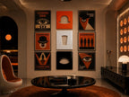 A wall display featuring six framed A Clockwork Orange posters arranged in two columns, flanking a central vertical row of three square panels depicting a bowler hat, a glass, and an eye in orange, white, and black colors.