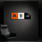 A set of three square wall art panels arranged horizontally. The left panel is orange with a black bowler hat silhouette, the center panel is white with a black glass silhouette, and the right panel is black with a white eye silhouette.